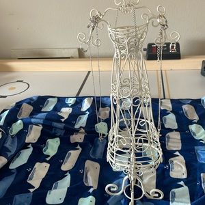 Dress rack jewelry holder.